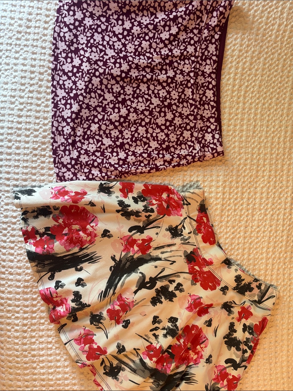 Abercrombie & Fitch Floral White Mini Skirt and Tranquility skort, purple/pink.